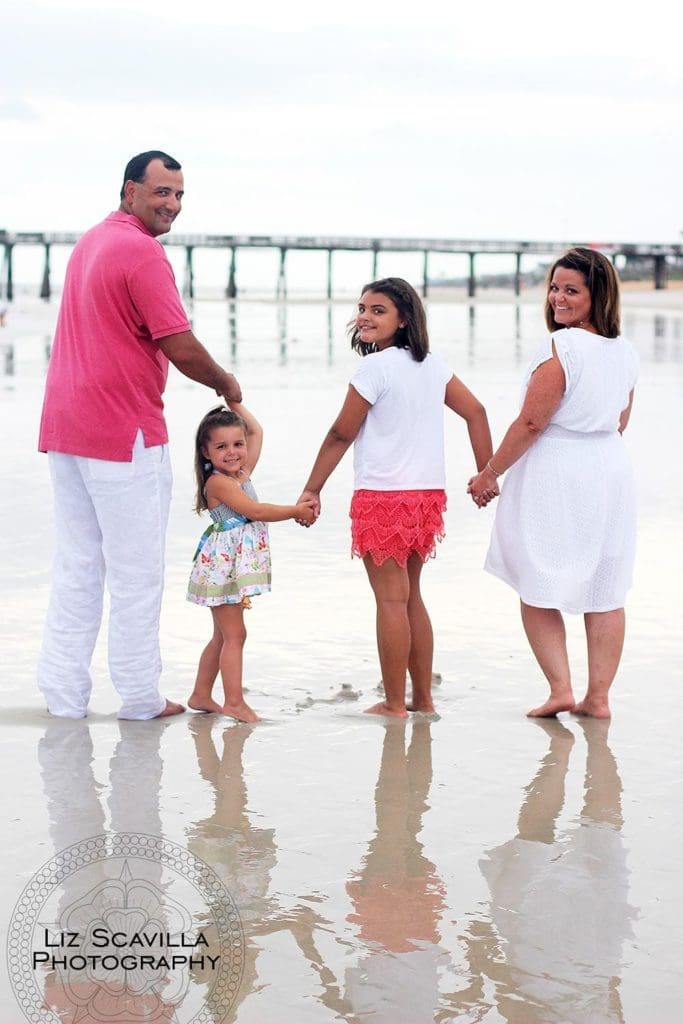 Family walking along the beach