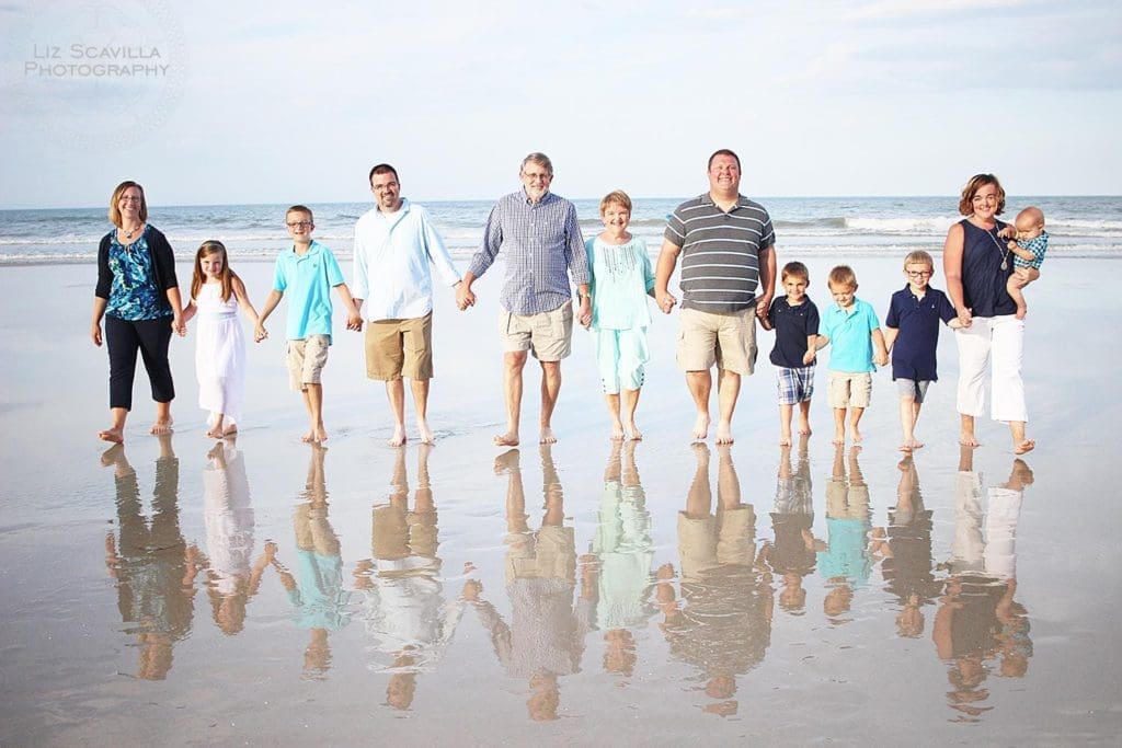 Family beach shoot water reflection