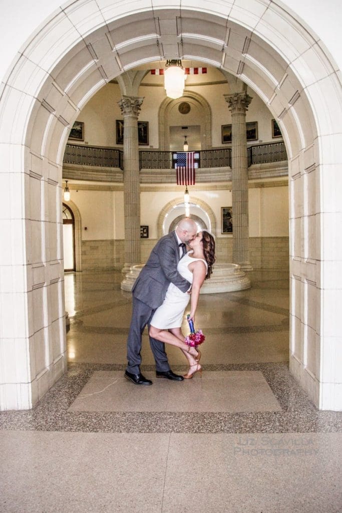 Kissing Under Archway