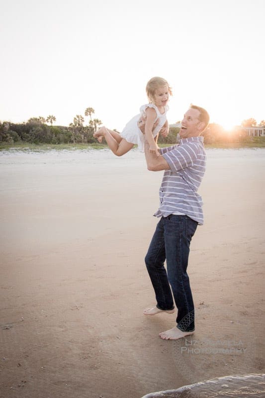 Dad Throwing Little Girl in Air
