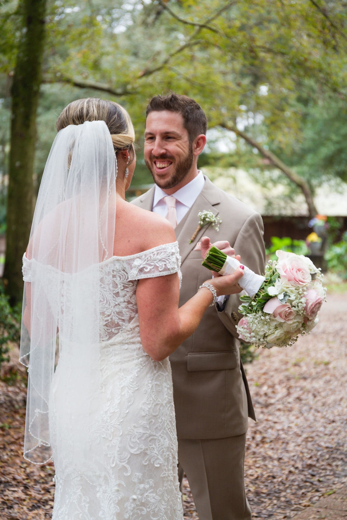 Look at that smile on the groom's face at their first look!