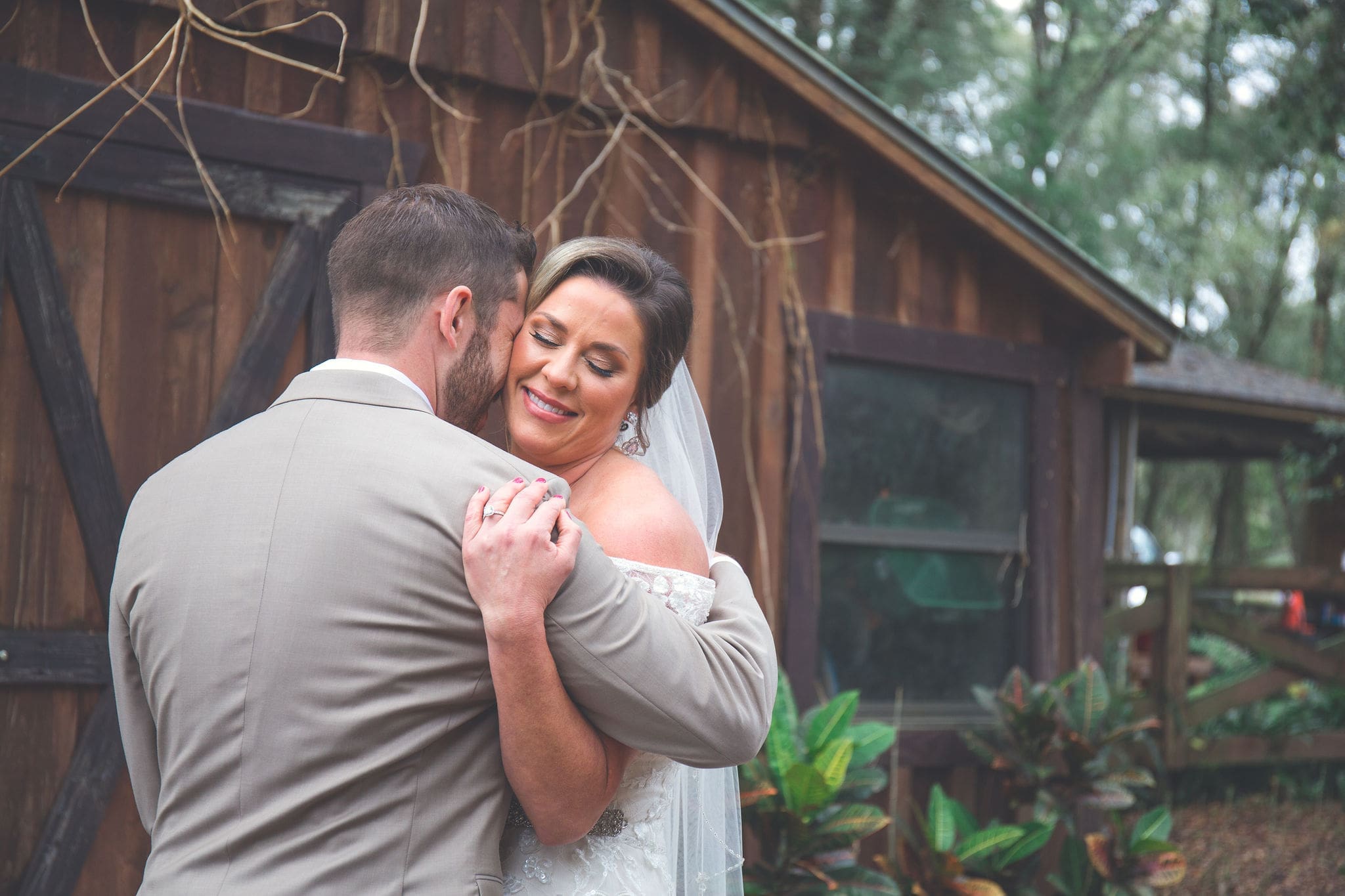 The bride and groom embracing at their first look before the ceremony.