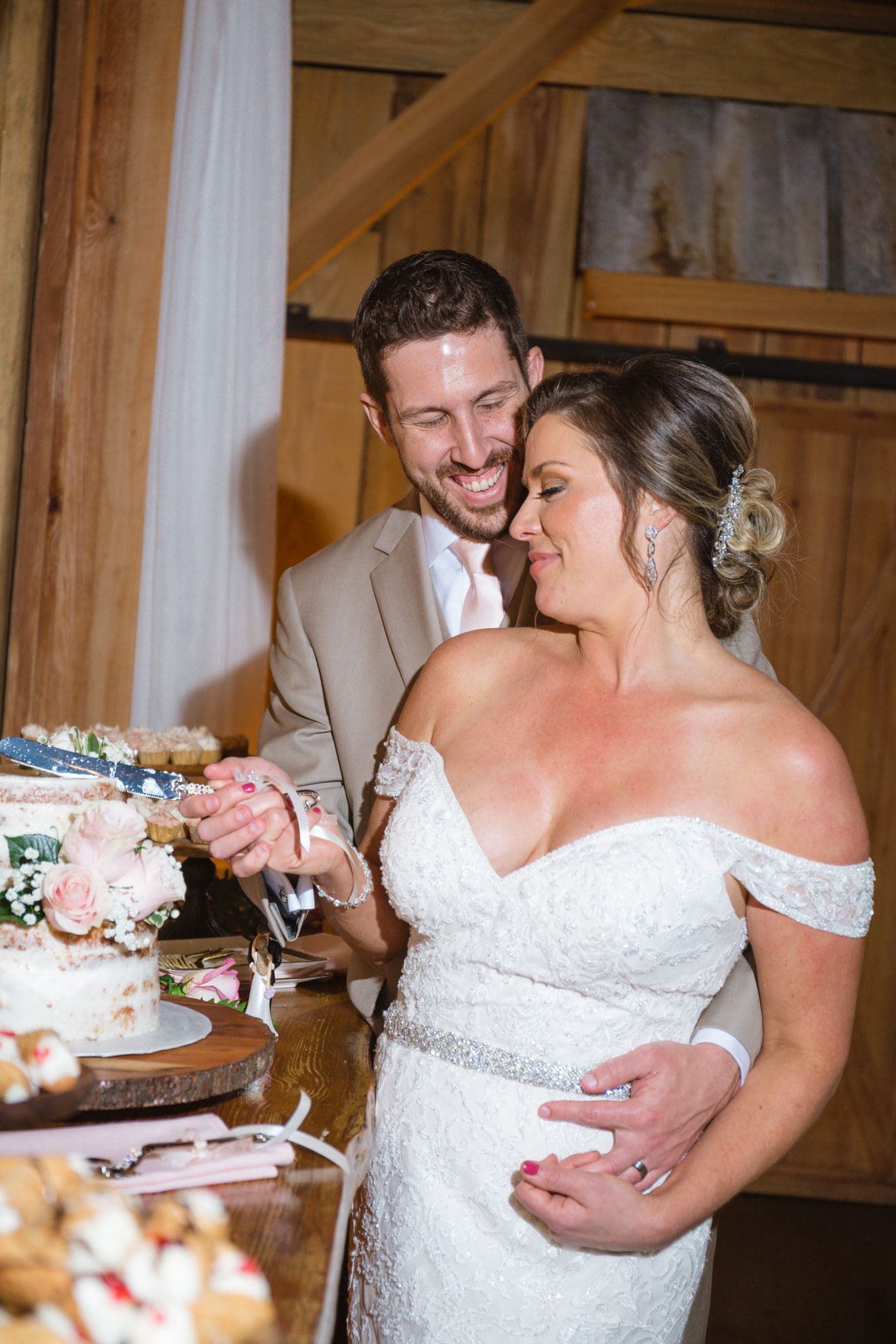Cutting the wedding cake.