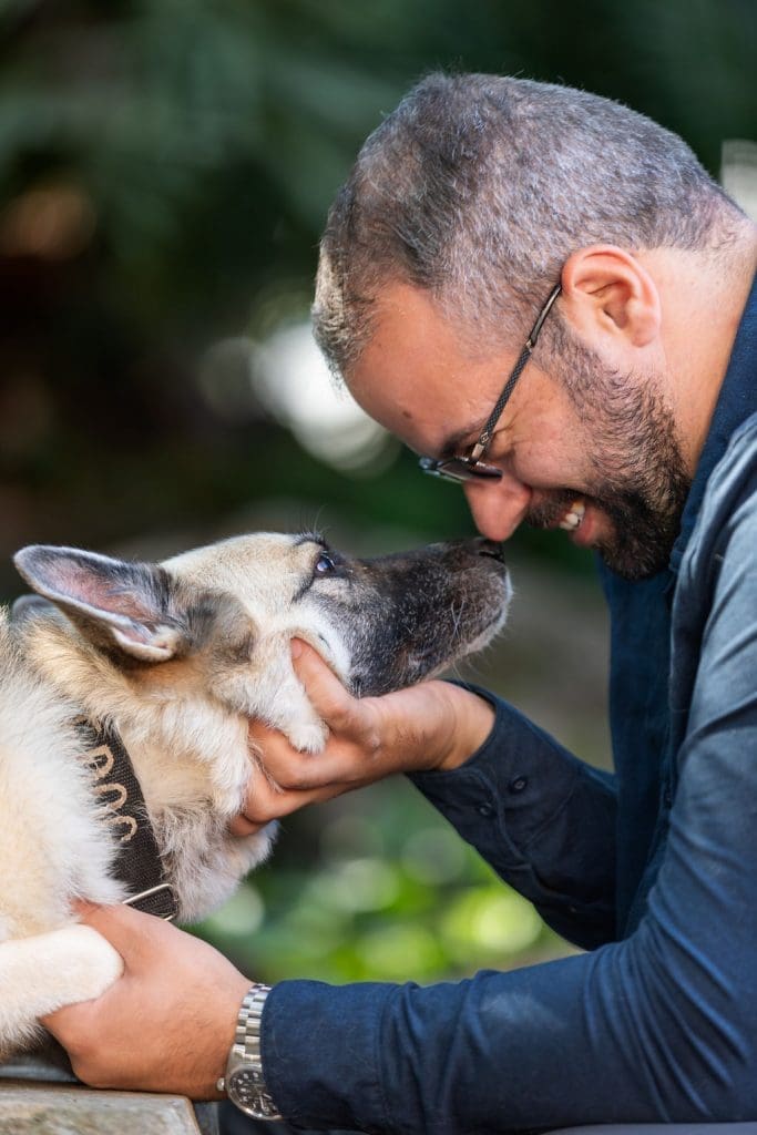 Happy dog and owner interacting