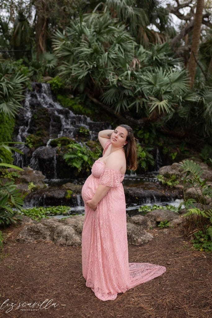Outdoor maternity photography session at a garden location near Ormond Beach, Florida