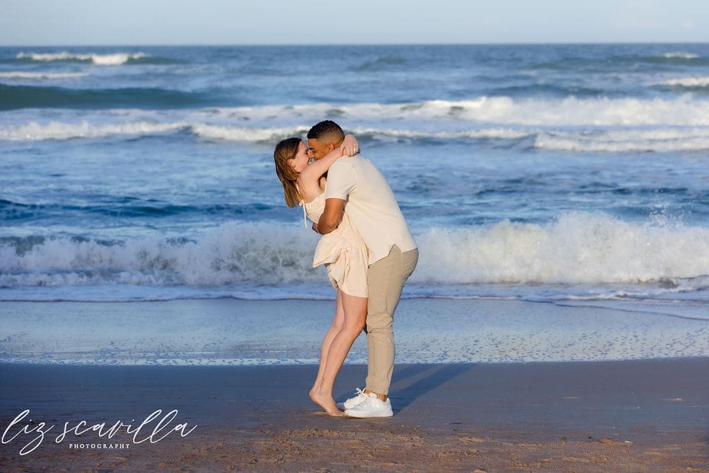 post proposal kiss beach candid moment