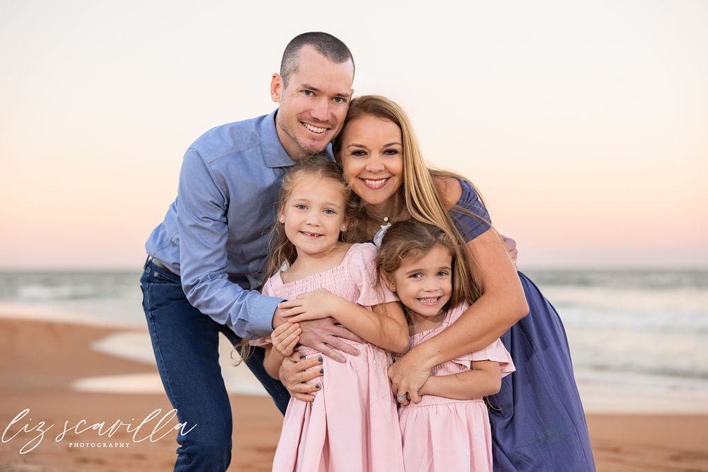 family photo outfit ideas for beach sessions with pink and blue outfits