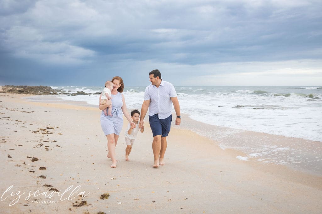 family walking on the beach coordinated outfits