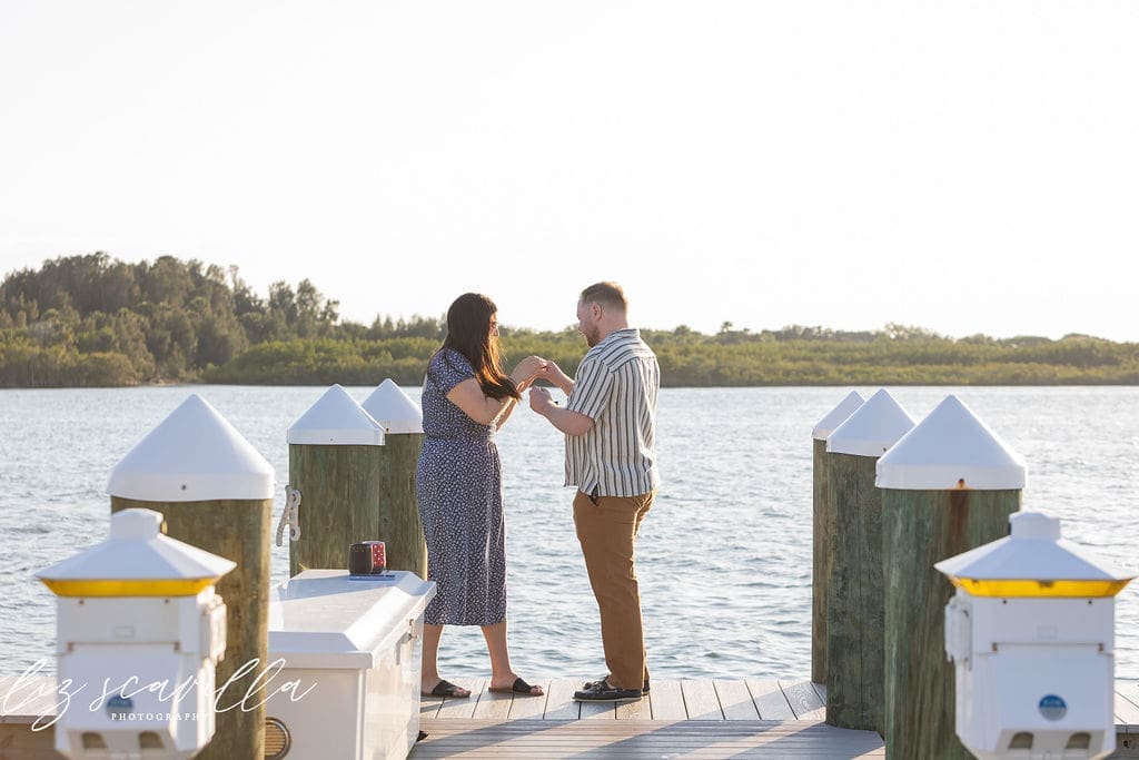 river dock proposal standing moment after engagement