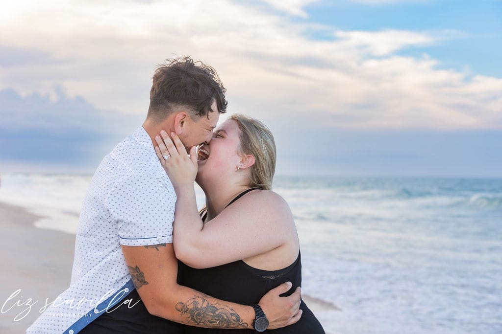 sunset beach proposal golden hour waves romantic